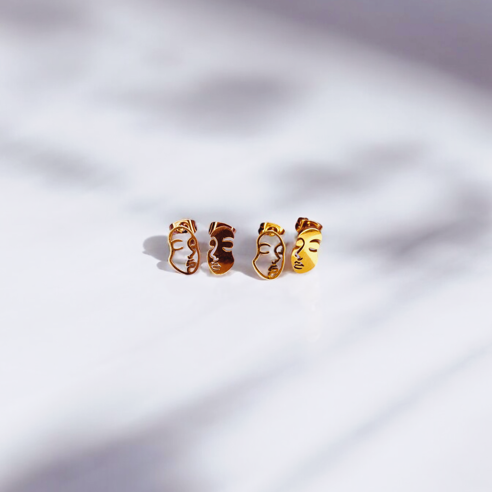 it's giving contour studs