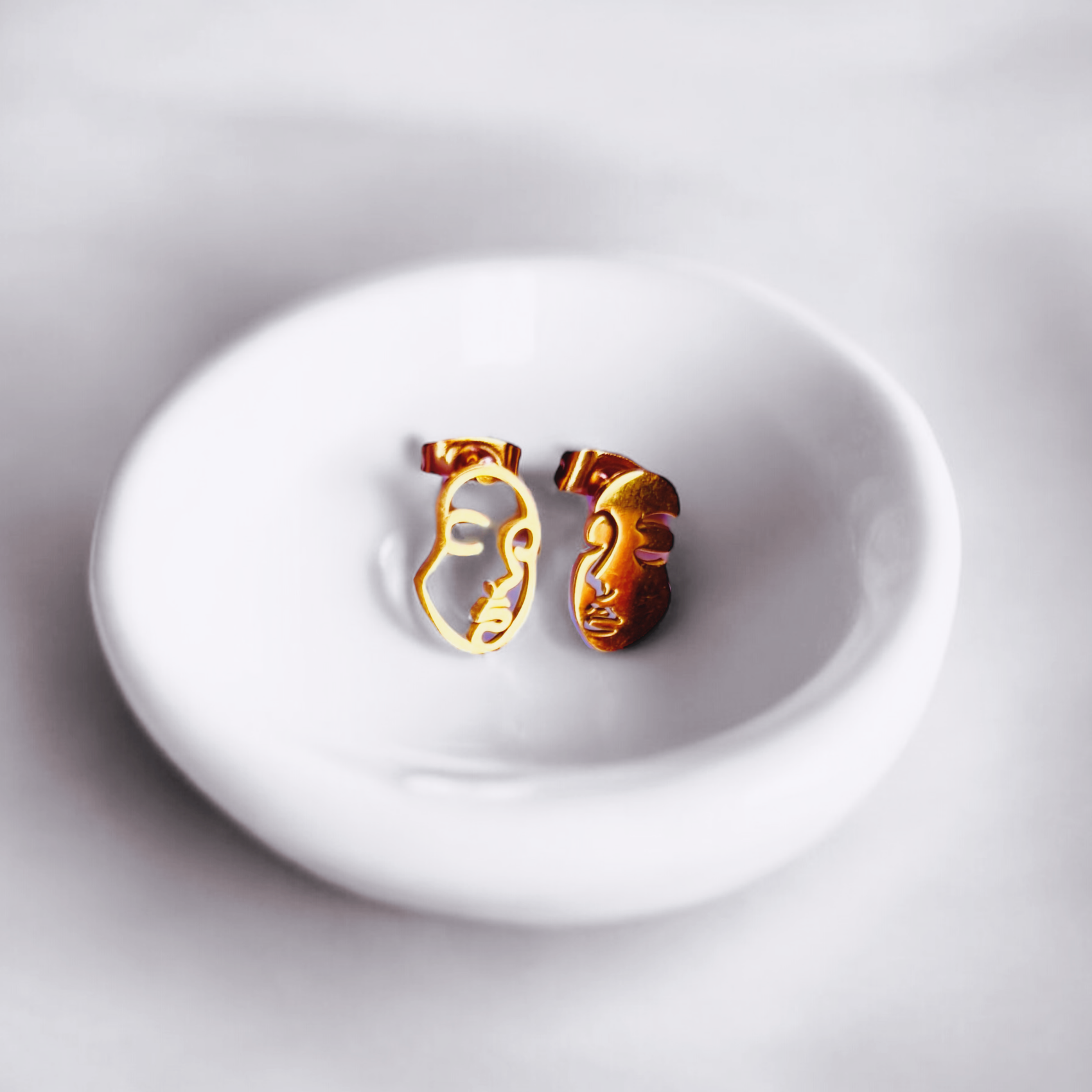 it's giving contour studs