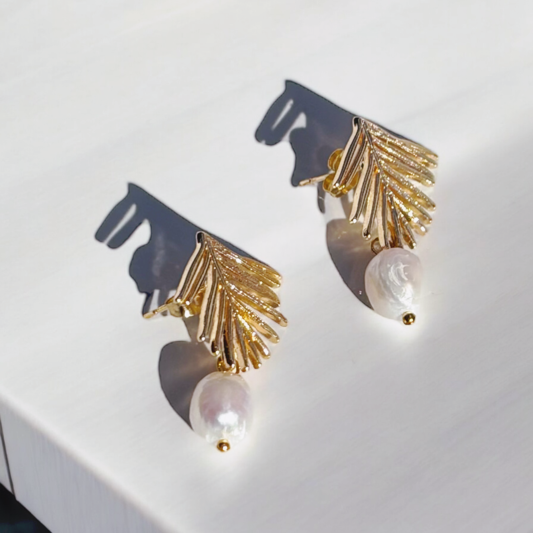 pearly palm dangles