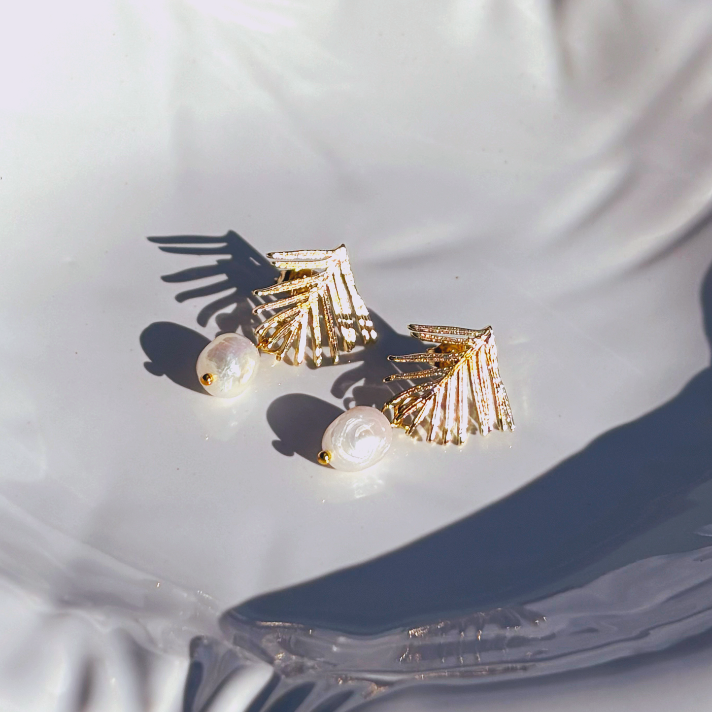pearly palm dangles